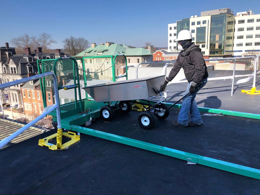 commercial roofing cart being dumped 3